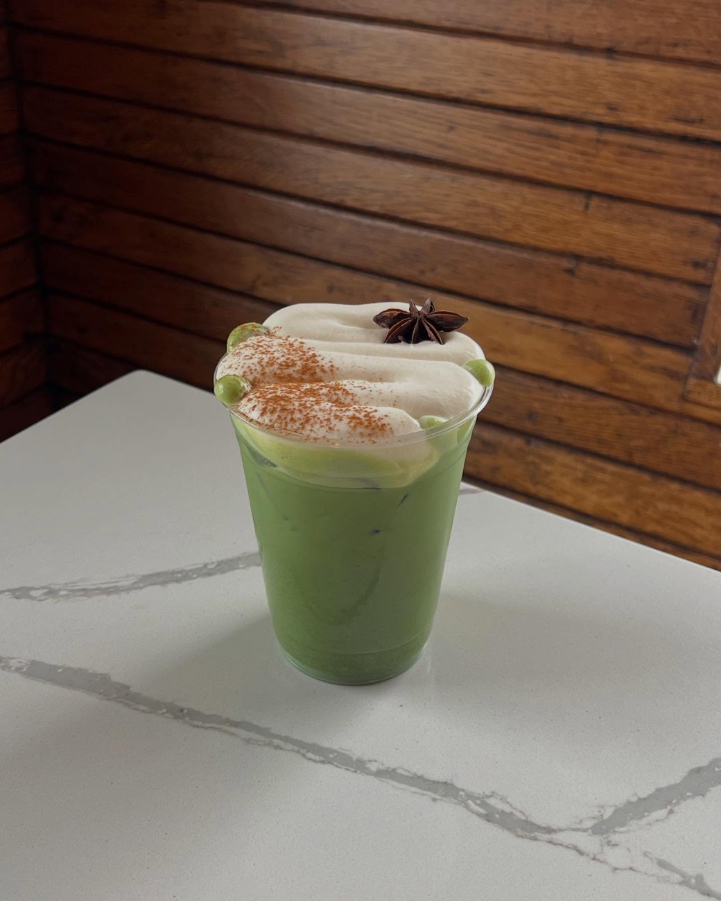 An iced matcha latte at Station